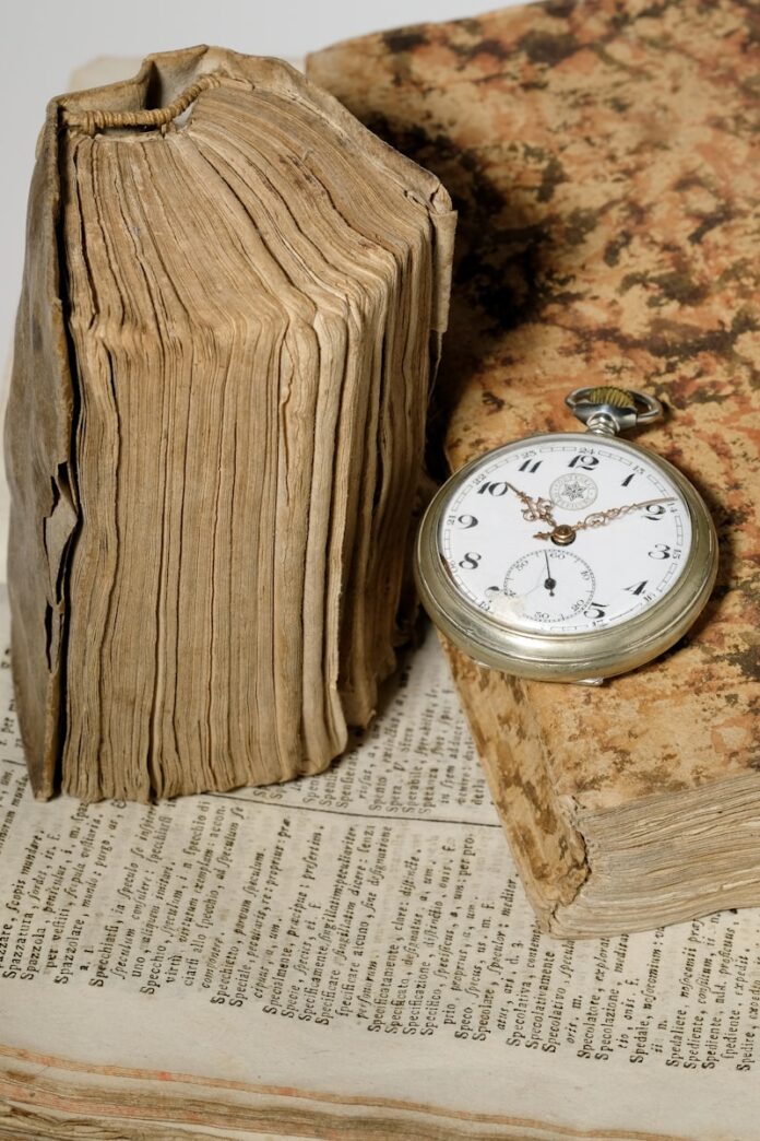 Photo by Daniele Levis Pelusi silver-colored pocketwatch at 10:20