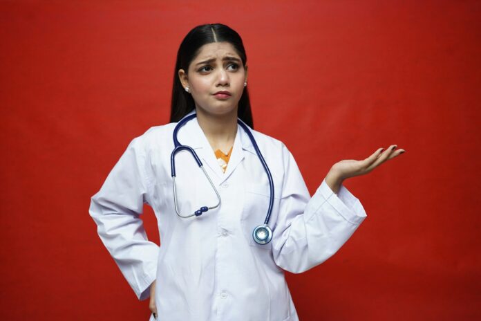 Photo by Fotos a doctor with a stethoscope around her neck