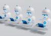 “AI로 똑똑하게 건강 챙기기… 일상에서 실천하는 똑똑한 활용법” a group of white robots sitting on top of laptops